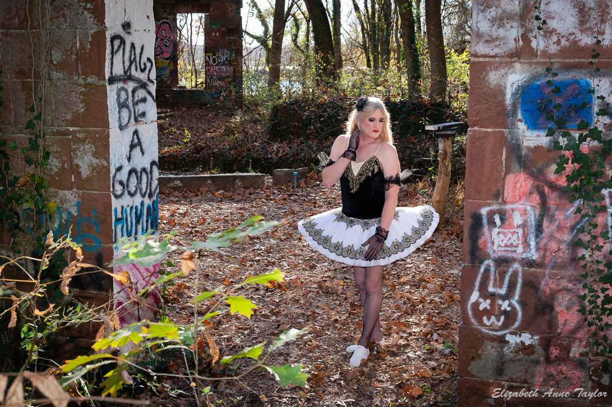 The golden hour sunshine highlights Allison's hair as she poses in a ballerina outfit in an abandoned mill in the Maryland woods. Allison enjoyed a trans makeover include transgender makeup artistry and photoshoot by Elizabeth Taylor. Makeovers with Elizabeth Taylor is located in Maryland adjacent to Washington, DC in the Mid-Atlantic in the USA.